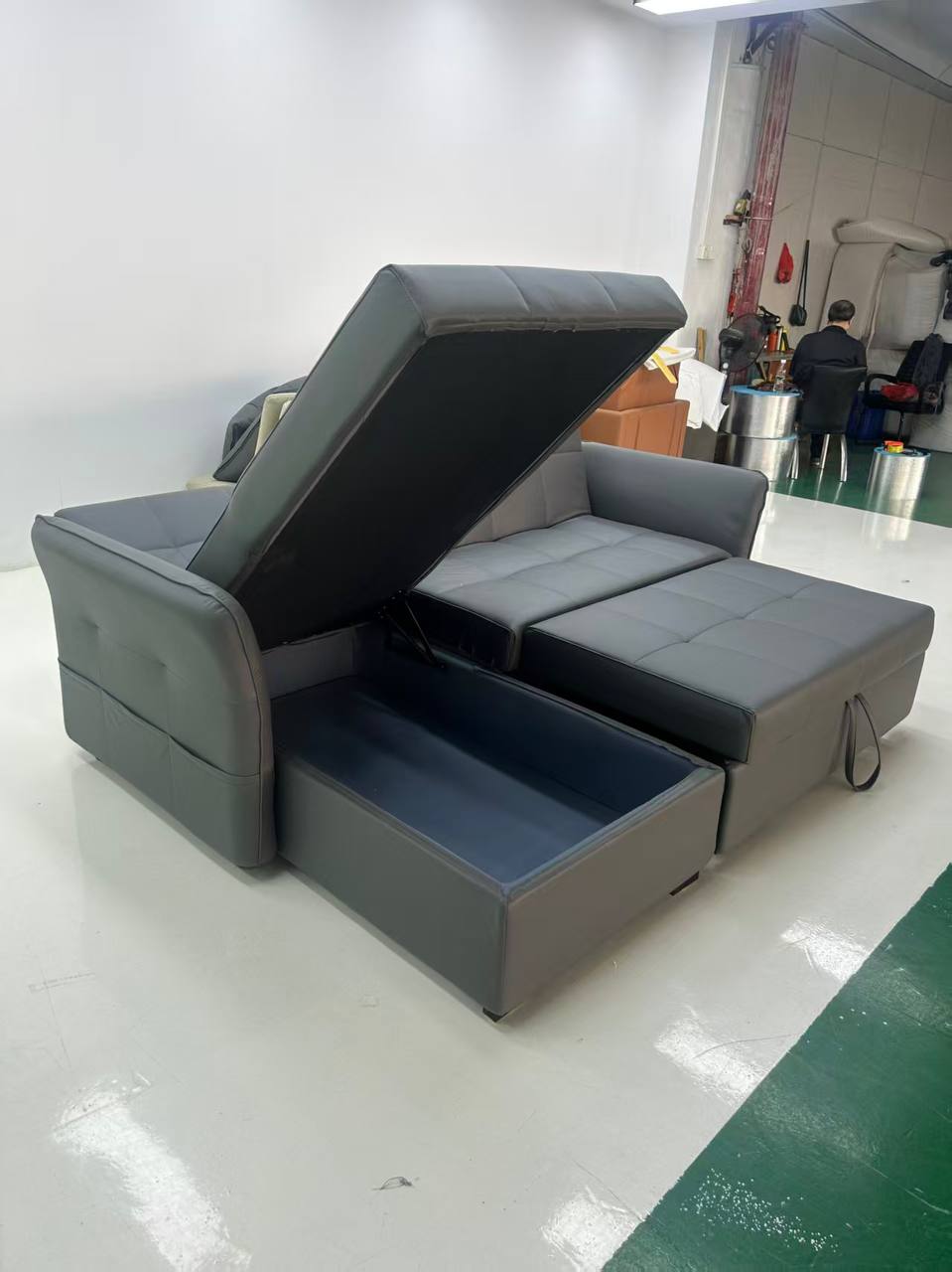 Carra L Shape Sofa Bed with Storage dark grey side view Carra L Shape Sofa Bed with Storage dark grey side view