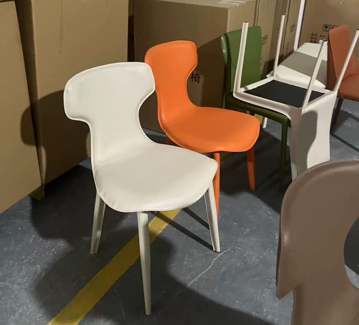 Poppy Saddle Leather Dining Chair in warehouse Poppy Saddle Leather Dining Chair in warehouse